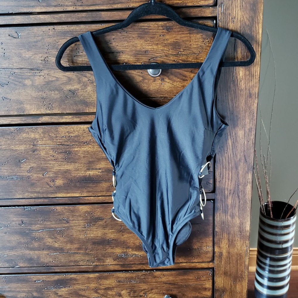 NWT Stylish one piece swim suit